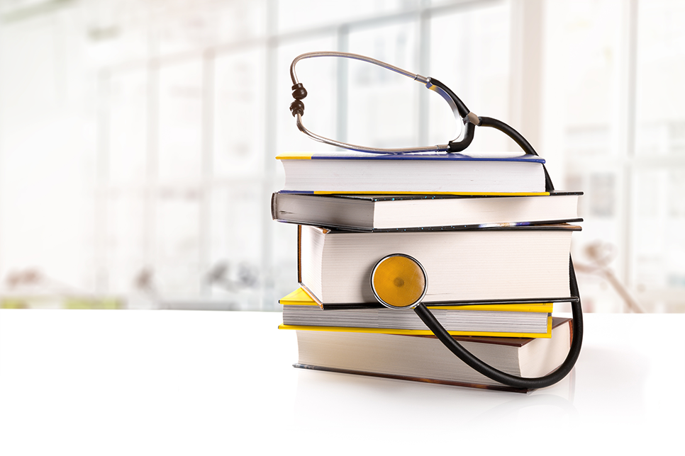 Books and stethoscope