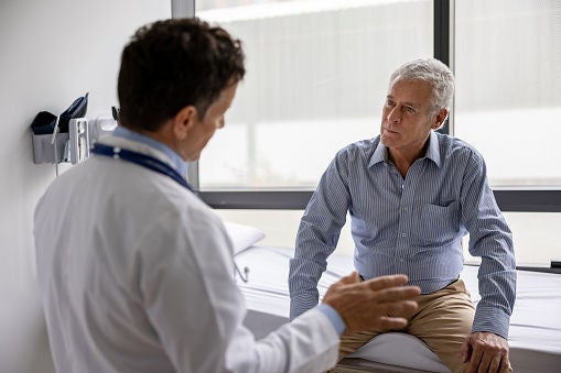 Physician discussing with patient 