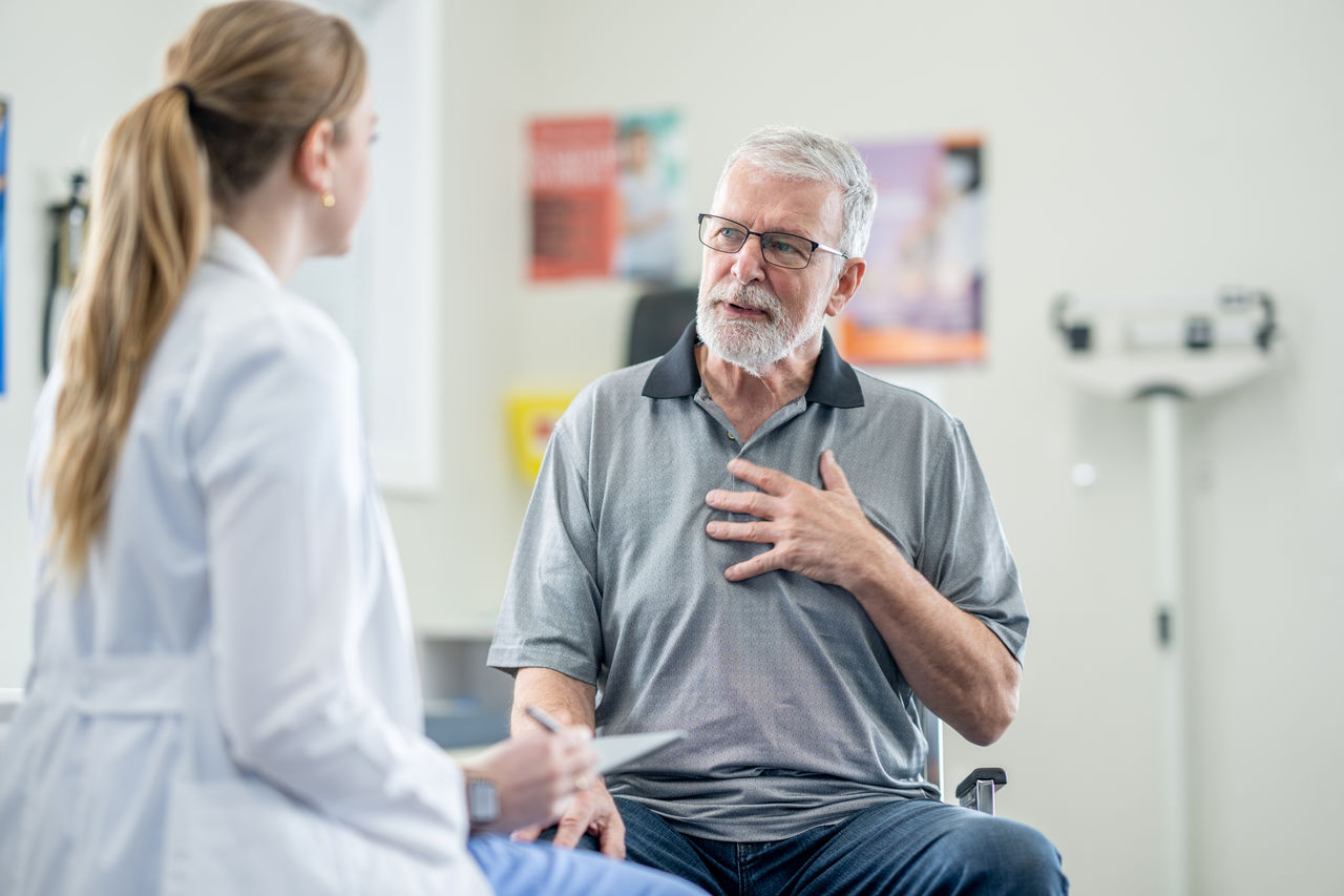 Physician discussing with patient 